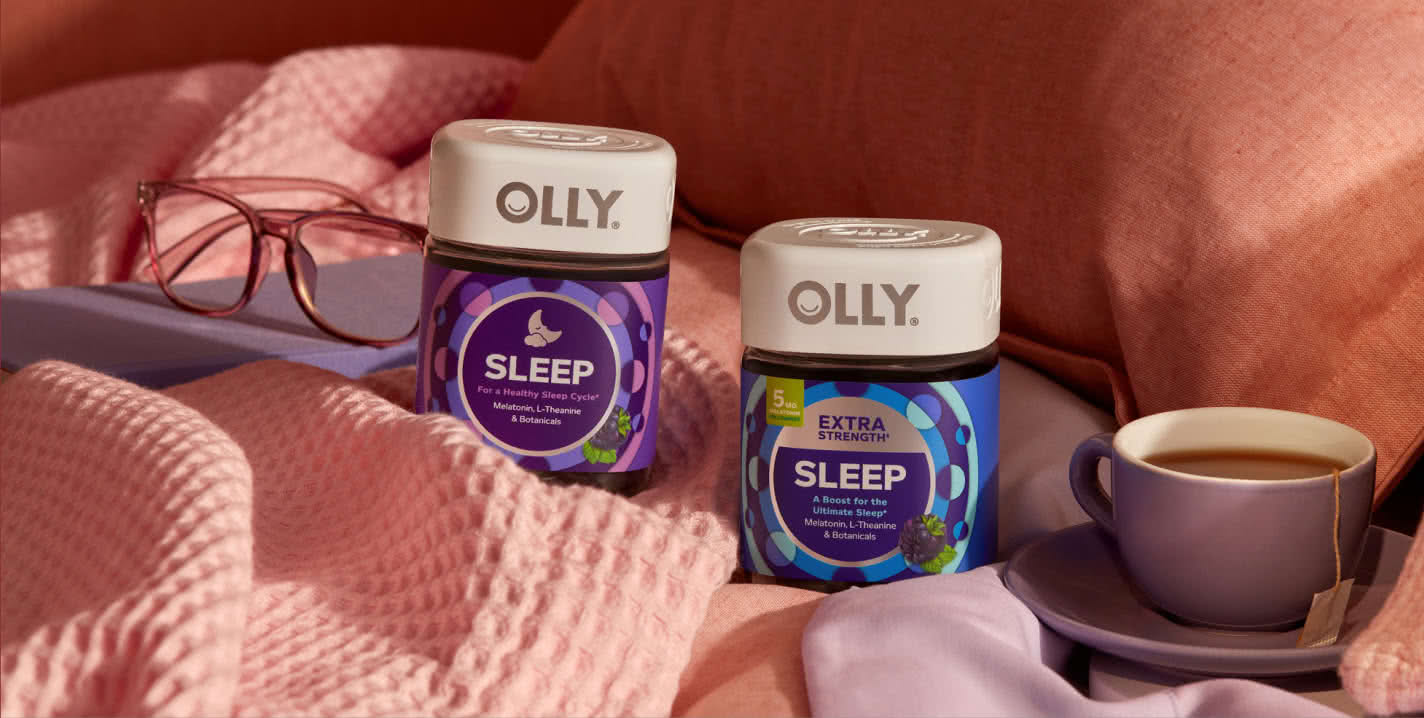 OLLY Sleep products lying on a bed