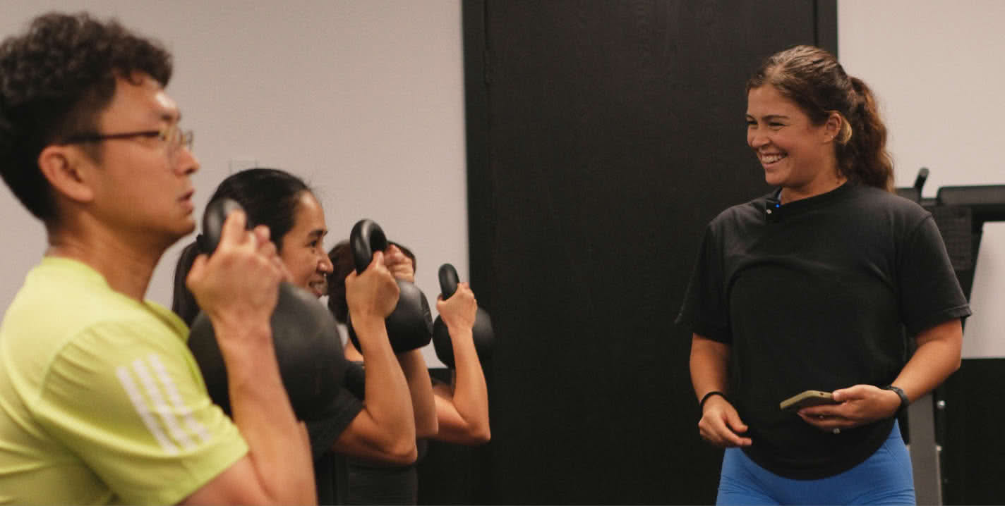 Rachel and her clients crushing a kettlebell session.