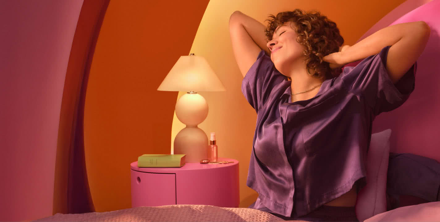 Woman waking up refreshed